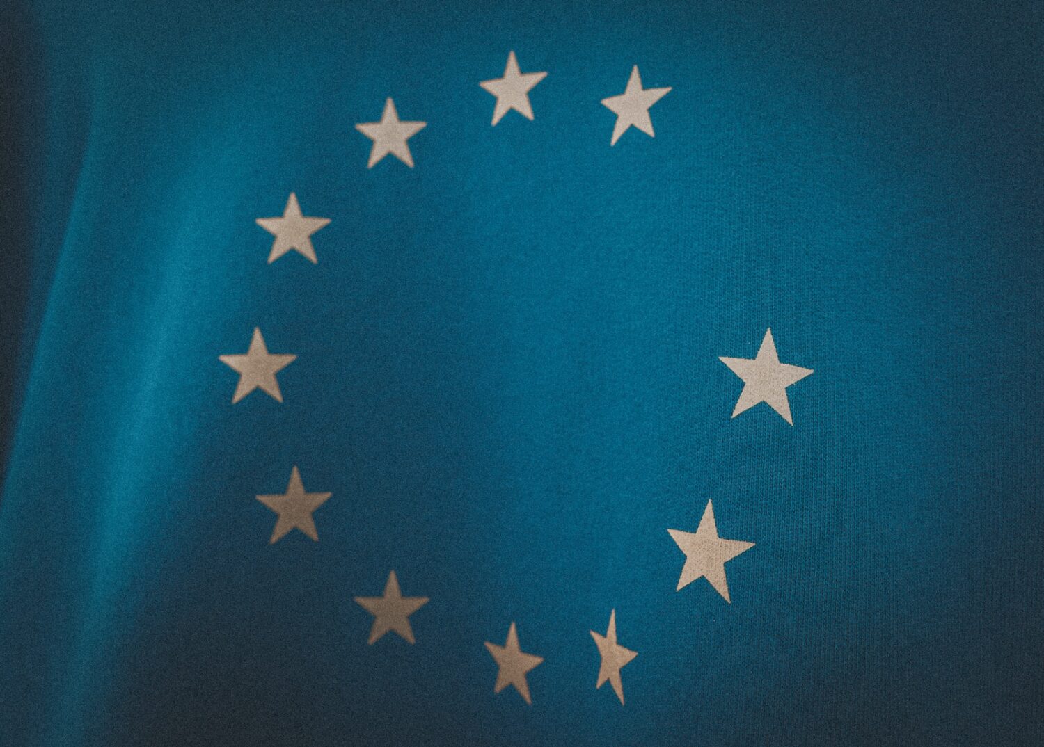 Photo by Christian Lue eu news - blue and white star print textile
